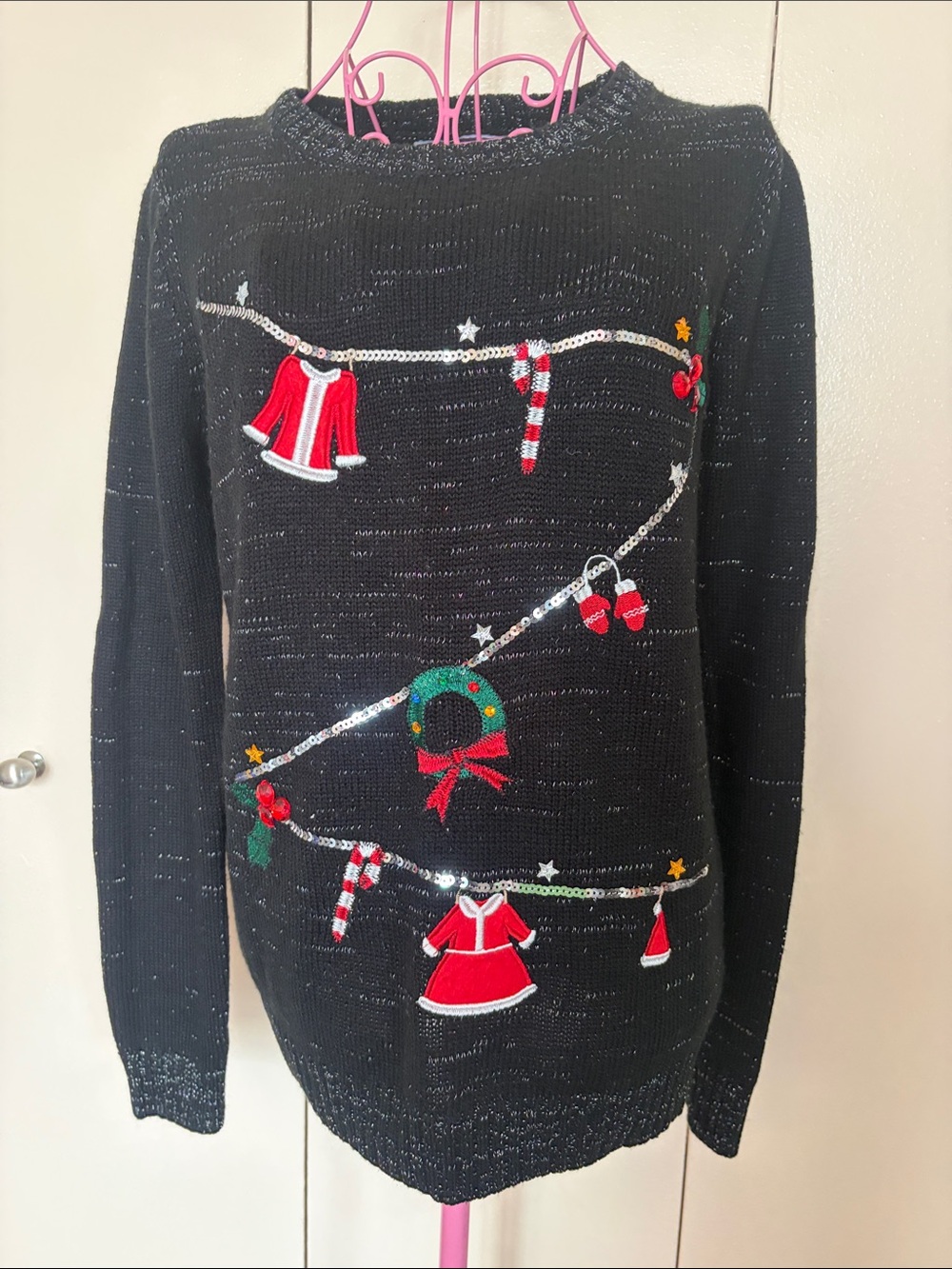 Women’s Black Holiday Sweater with Red Festive Appliqués